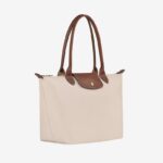 کیف زنانه رنگ استخوانی اورجینال سایز M برند لانگ چمپ Longchamp
