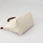 کیف زنانه رنگ استخوانی اورجینال سایز M برند لانگ چمپ Longchamp - Image 2