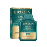 شامپو ضد ریزش مدل آرگان و کراتین حجم 300 میل برند بیوکسین – Bioxcin